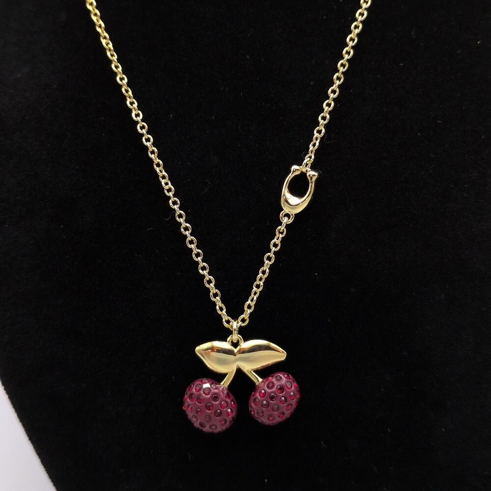 COACH Signed Red Rhinestone Cherry Pendant Necklace Gold Tone Adjustable Chain